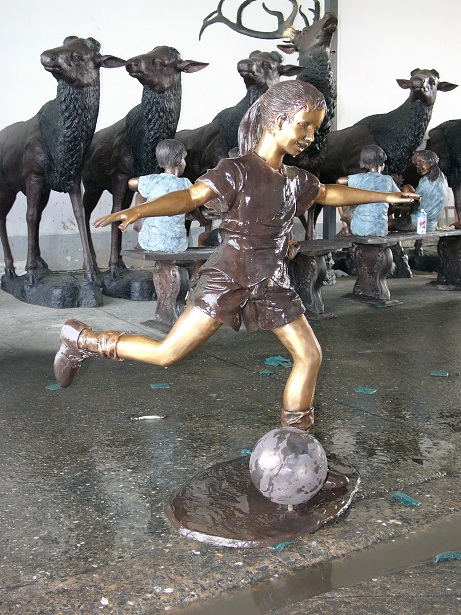 Young Girl Playing Soccer